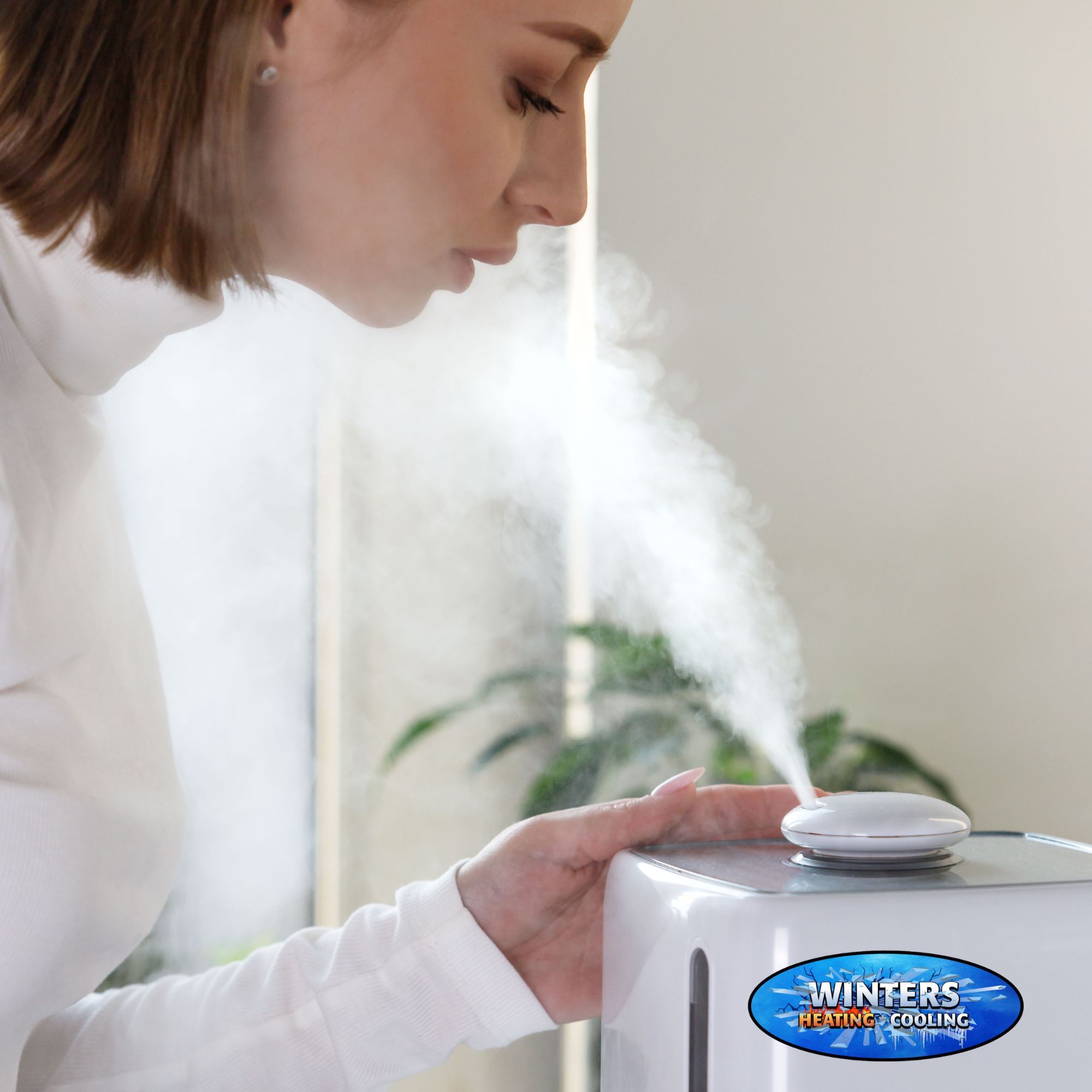 woman using a humidifier