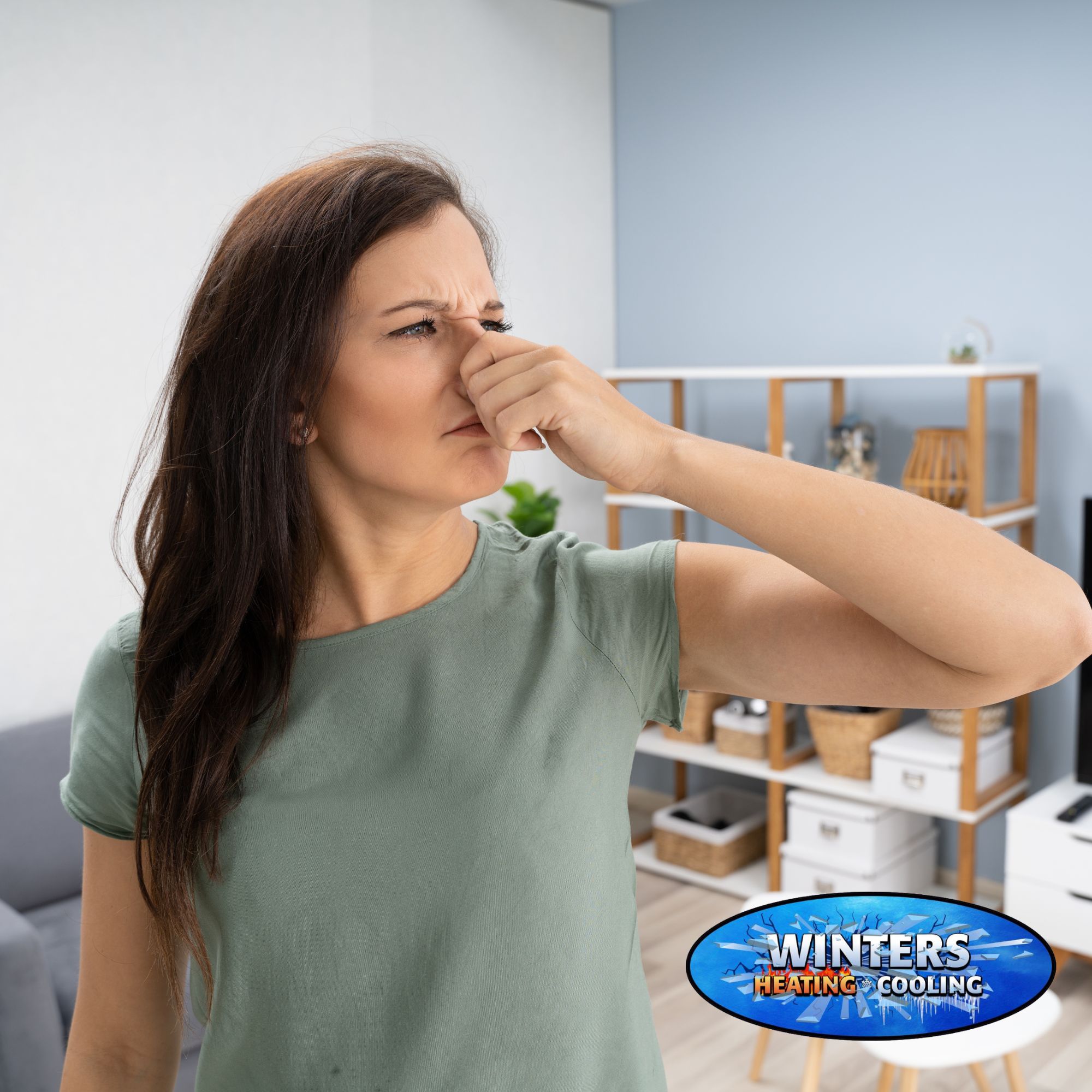 women holding nose in home