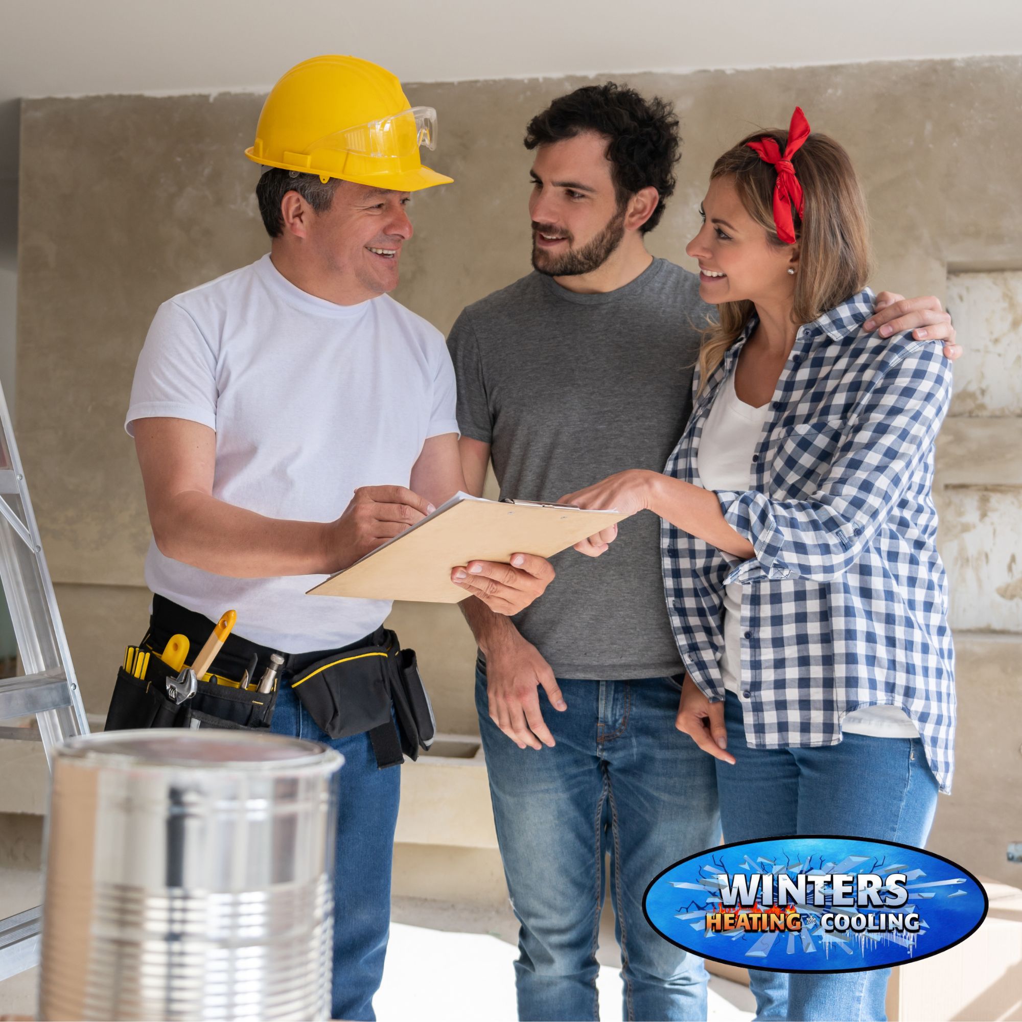 A couple talking to HVAC contractor